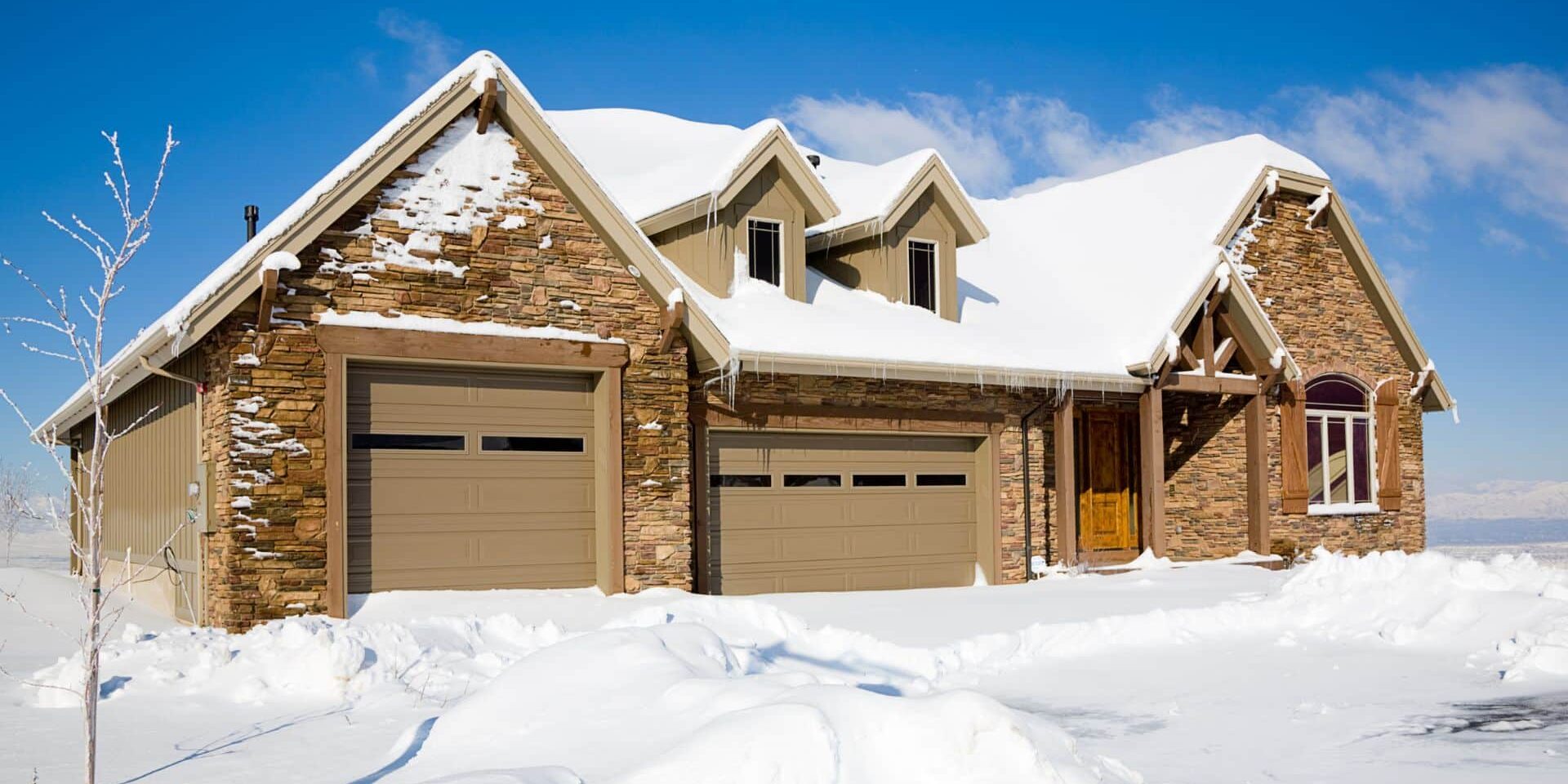 House in the snow Garage Door Insulation